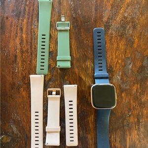 Fitbit Versa 2 Smartwatch with extra Blue and Green Bands